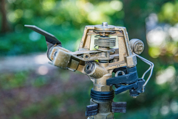 garden sprinkler head watering lawn